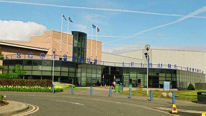 Exterior of Glasgow Club Scotstoun with blue skies above building 