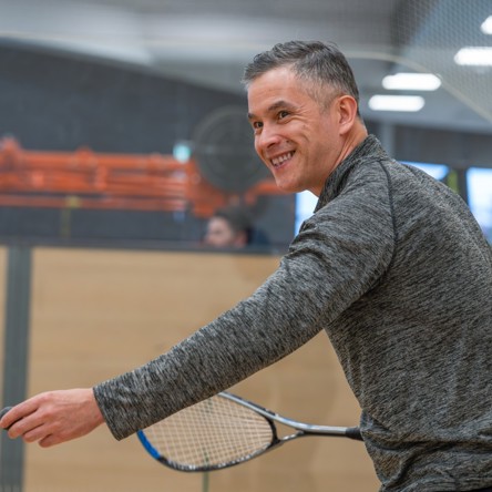Glasgow Club member playing squash