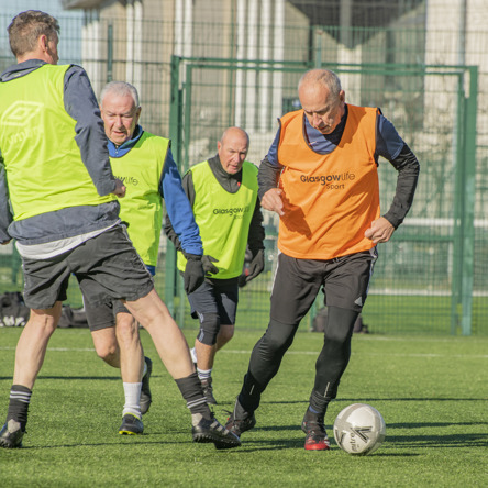 A group of players taking part in a walking football session