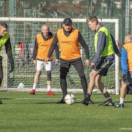 A group players taking part in walking football session